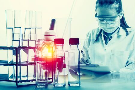 scientist with equipment and science experiments with lighting effect vintage styleの写真素材
