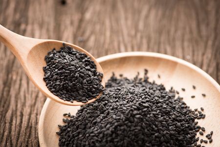 black Sesame close up shot  on wood backgroundの写真素材