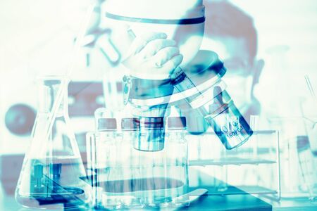 scientist with equipment and science experiments ; science backgroundの写真素材