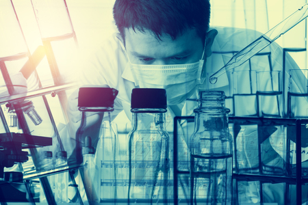 scientist with equipment and science experiments ; science backgroundの写真素材