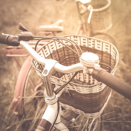 beautiful landscape image with Bicycle at sunset ; vintage filter styleの写真素材