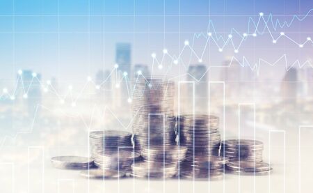 rows of coins for finance and banking concept with Forex graph on the business background. A...