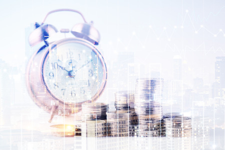 Double exposure of city and rows of coins for finance and banking concept,Business Finance and Money concept,Save money for prepare in the future.の写真素材