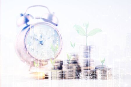 Double exposure of city and rows of coins for finance and banking concept,Business Finance and Money concept,Save money for prepare in the future.の写真素材