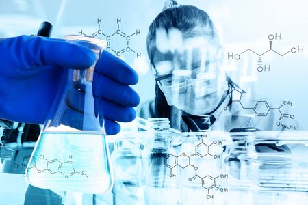 Laboratory glassware containing chemical liquid, science research