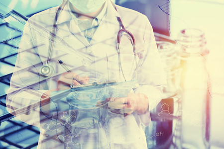 scientist writing report with equipment and science experiments,science backgroundの写真素材