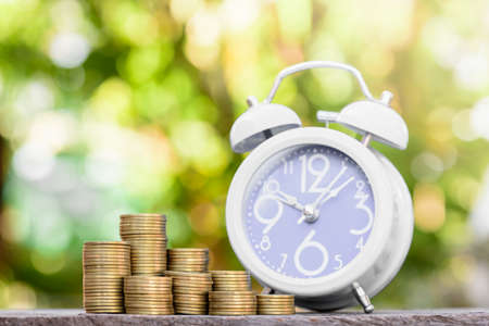 hand putting money coin stack growing business,Finance and Money concept,Hope of investor conceptの写真素材