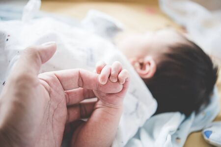 new born baby handの写真素材