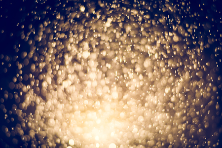 gold abstract background with bokeh defocused lights