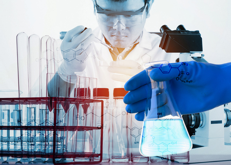 double exposure of Scientists and scientific equipment In the laboratory,Laboratory research concept,science backgroundの写真素材