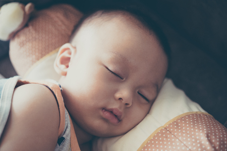 Little cute baby sleepingの写真素材