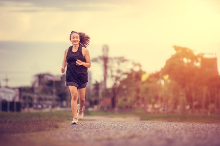 beautiful Asian girls Jogging in the park,Healthy Conceptの写真素材