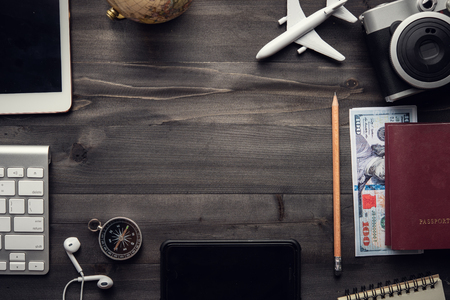 Travel accessories and costume on wooden floor,Travel concept.coppy space for text or design.の写真素材