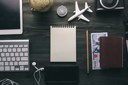 Travel accessories and costume on wooden floor,Travel concept.の写真素材