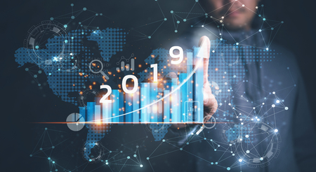 2019 New year planning business and financial concept. Businessman touching virtual screen on growth graph chart and data, business strategy, banking and investment, digital marketing and payment.の写真素材
