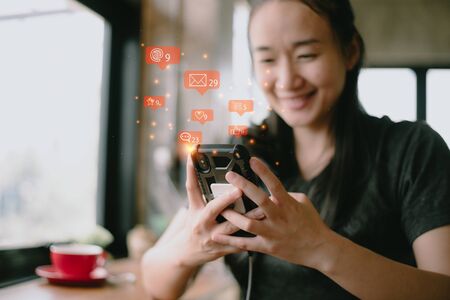 Businesswoman use smartphone with social media icon, marketing ideas ,Social media conceptの写真素材