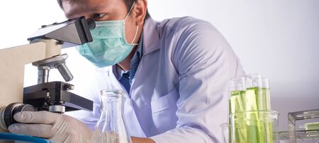 Science sciences are using a microscope in research.science background.Laboratory research conceptの写真素材