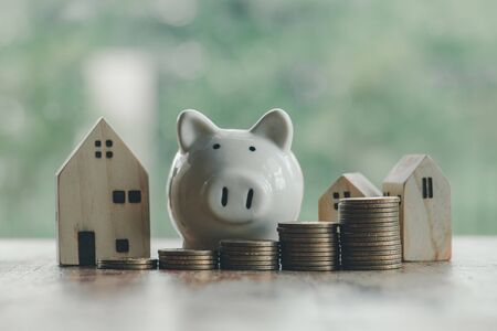 Concept of saving money to buy a house for the future.の写真素材