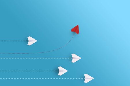 Creative paper planes on blue background. Leadership and success concept.の写真素材