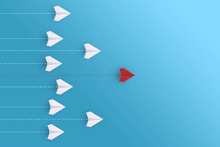 Creative paper planes on blue background. Leadership and success concept.の写真素材