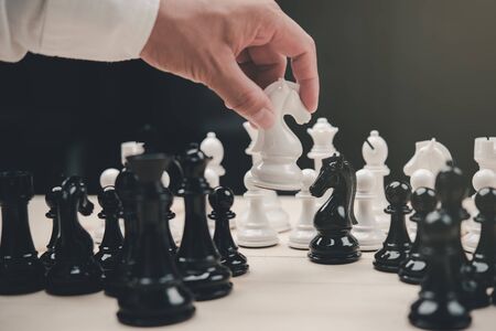 black and white chess battle,Chess victory,chess concept. strategy, management or leadership concept.の写真素材