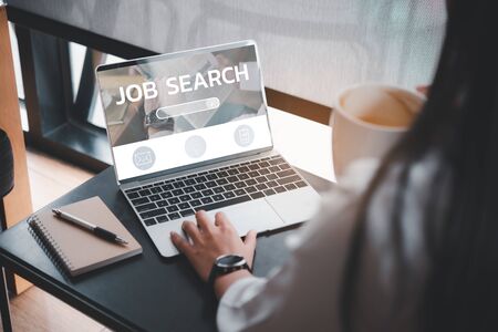 job search concept, find your career, woman looking at online websiteの写真素材