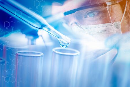 double exposure scientists and scientific equipment In the laboratory,Laboratory research concept.science background.biotechnoloy research concept.の写真素材