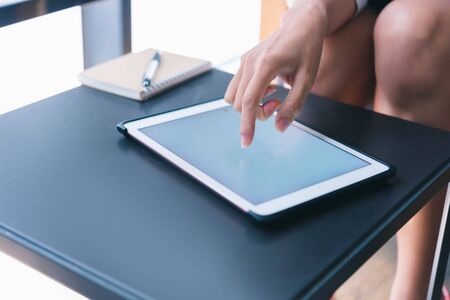 woman hand using digital tablet computerの写真素材