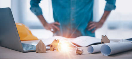 Engineers or architects is watching on light bulb for concept of construction Design Ideas .Construction and structure concept.の写真素材
