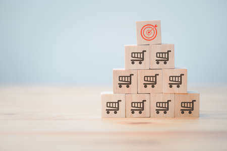 Sale volume increase make, business success grow wood cube with icon shopping cart and target goal....