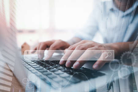 Data Search Technology Search Engine Optimization. man's hands are using a computer notebook to Searching for information.Using Search Console with your website.の写真素材