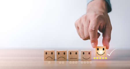 best excellent business services rating customer experience. Satisfaction survey concept. Hand of a...
