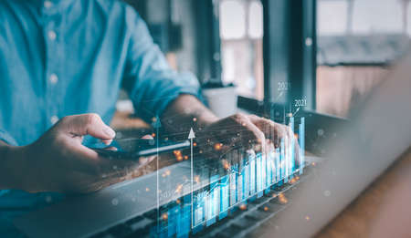 2021 business finance technology and investment concept. Stock Market Investments Funds and Digital Assets. businessman analysing forex trading graph financial data. Business finance background.の写真素材