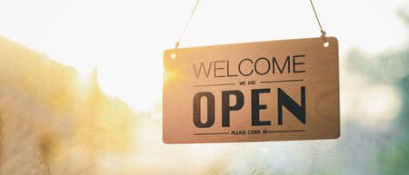 "Open" on cafe or restaurant hang on door at entrance.after covid-19,new nor mal,new life styleの写真素材