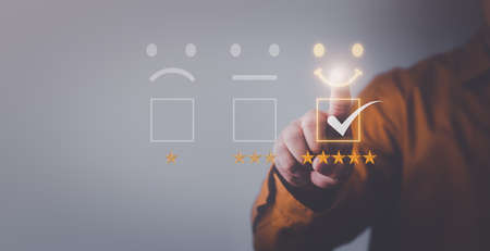 Customer service and Satisfaction concept  ,Business people are touching the virtual screen on the...