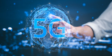 Businessman Pressing on the world of 5G, concept of future technology 5G network wireless systems and internet of thingsの写真素材