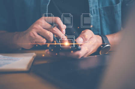 Document Management System (DMS), online documentation database and process automation to efficiently manage files, knowledge and documentation in enterprise with ERP. Corporate business technology.の写真素材