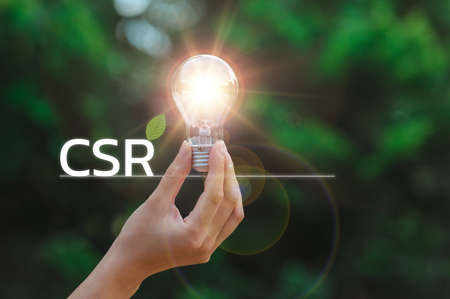 light bulb with CSR Corporate Social Responsibility, CSR and Sustainability Responsible Office
