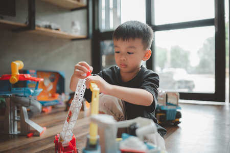 Portrait Asian Boy 3-4 years old Playing toys. To learn and enhance development skillの写真素材