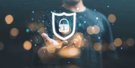 Security shield Lock Security Businessman Protect Concept, man using digital padlock with data...