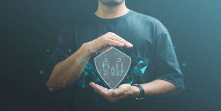 Businessman with protective gesture and family, life, health and house insurance icons. Insurance concept, Family life insurance and policy concepts.の写真素材