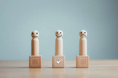 Customer satisfaction survey concept, service, rating, wood doll standing on wood block with...
