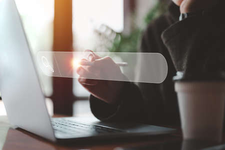 Data Search Technology, Search Engine Optimization. woman's hands using a laptop computer to Searching for information. Search Console with your website.の写真素材
