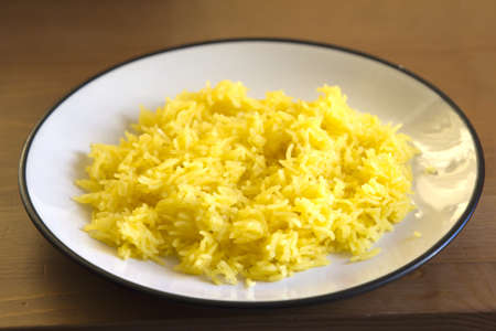 Zarda yellow saffron rice  dessert on plateの写真素材
