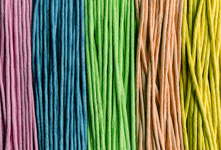 Multicolored threads wound vertically