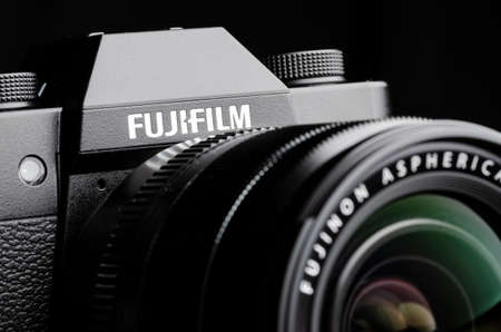 Japan, Tokyo - March 9, 2020: Fujifilm camera with fujinon aspherical lens on black backgroundのeditorial素材