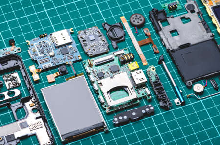 Electronic parts of old mobile phone with semiconductor parts and precious metalsの写真素材