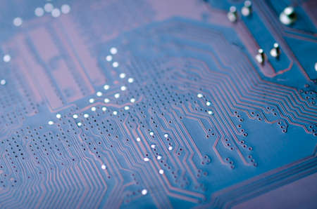 Conductive lines on an electronic board close-up abstract, soft focus, background