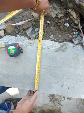 Close up measuring instrument in use, precise tool capturing accurate real-time measurement