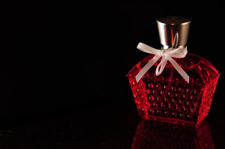 Perfume bottle on black backgroundの写真素材